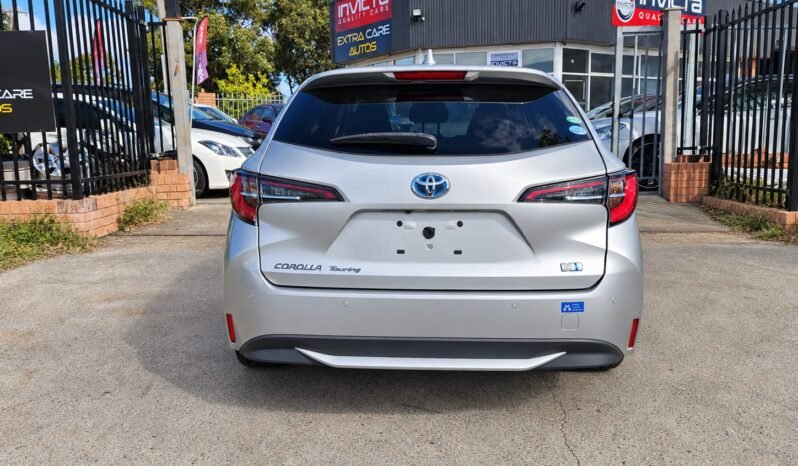 
								Toyota Corolla Touring  Hybrid full									
